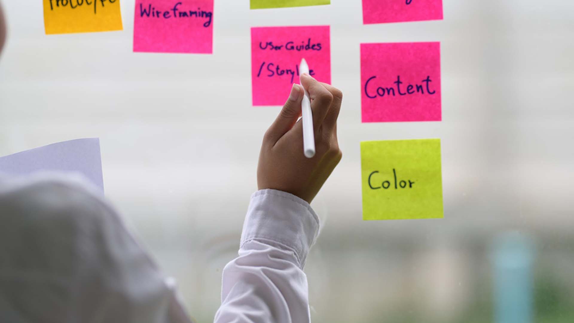 Sticky notes on a clearboard